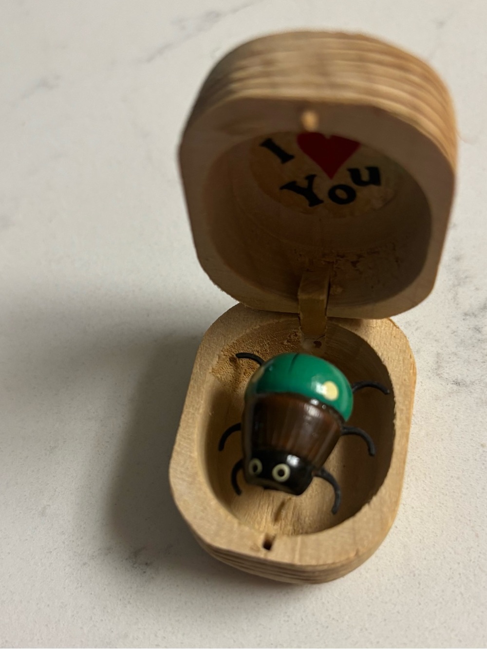 TINY BEETLE BUG IN A BOX (some wear)